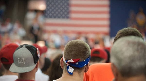 An attendee with a flag bandana made in China wait for Republican candidate for President Donald Trump to speak at a rally at Erie Insurance Arena on August 12, 2016 in Erie, Pennsylvania.