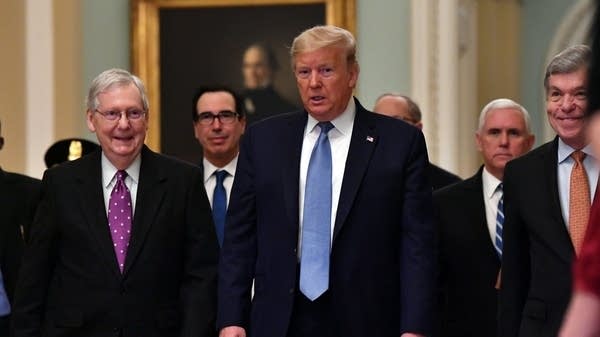 Trump arrives on Capitol Hill, with U.S. Senate Majority Leader Mitch McConnell, and Treasury Secretary Steven Mnuchin.