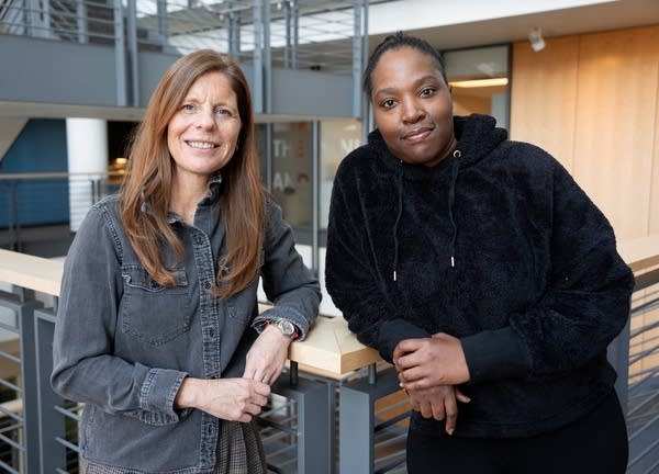 two women posing for a portrait