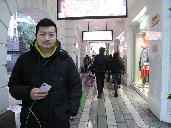 Restaurant worker Xing Zuoming spent more than a month’s salary on a new iPhone.