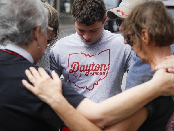 Dayton, site of latest mass shooting, warily awaits Trump
