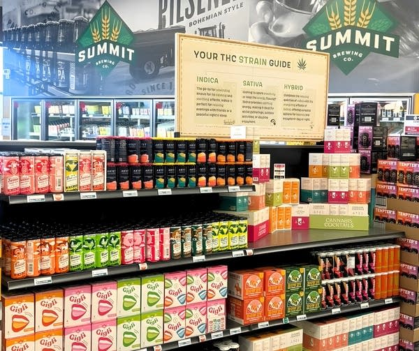 THC drinks are displayed on a store shelf.