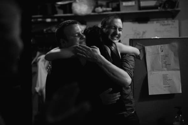 Dessa hugs Sean McPherson and Dustin Kiel after performing a show at the Fitzgerald Theater.
