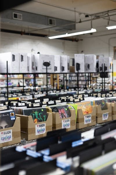 Rows and rows of records on display in a record store