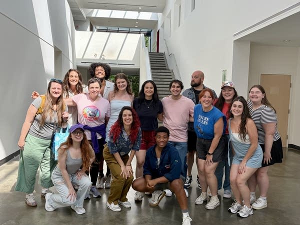 A large group poses for a photo.