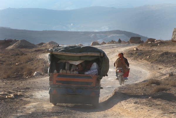 Fleeing fighting in the mountains of Syria