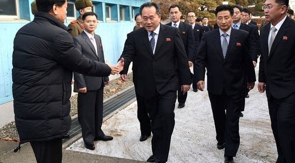 The head of North Korean delegation Ri Son-Gwon (C) crosses a border line to attend their meeting at Panmunjom in the Demilitarized Zone on Jan. 9, 2018 in Panmunjom, South Korea. South and North Korea are scheduled to begin their first official face-to-face talks in two years.