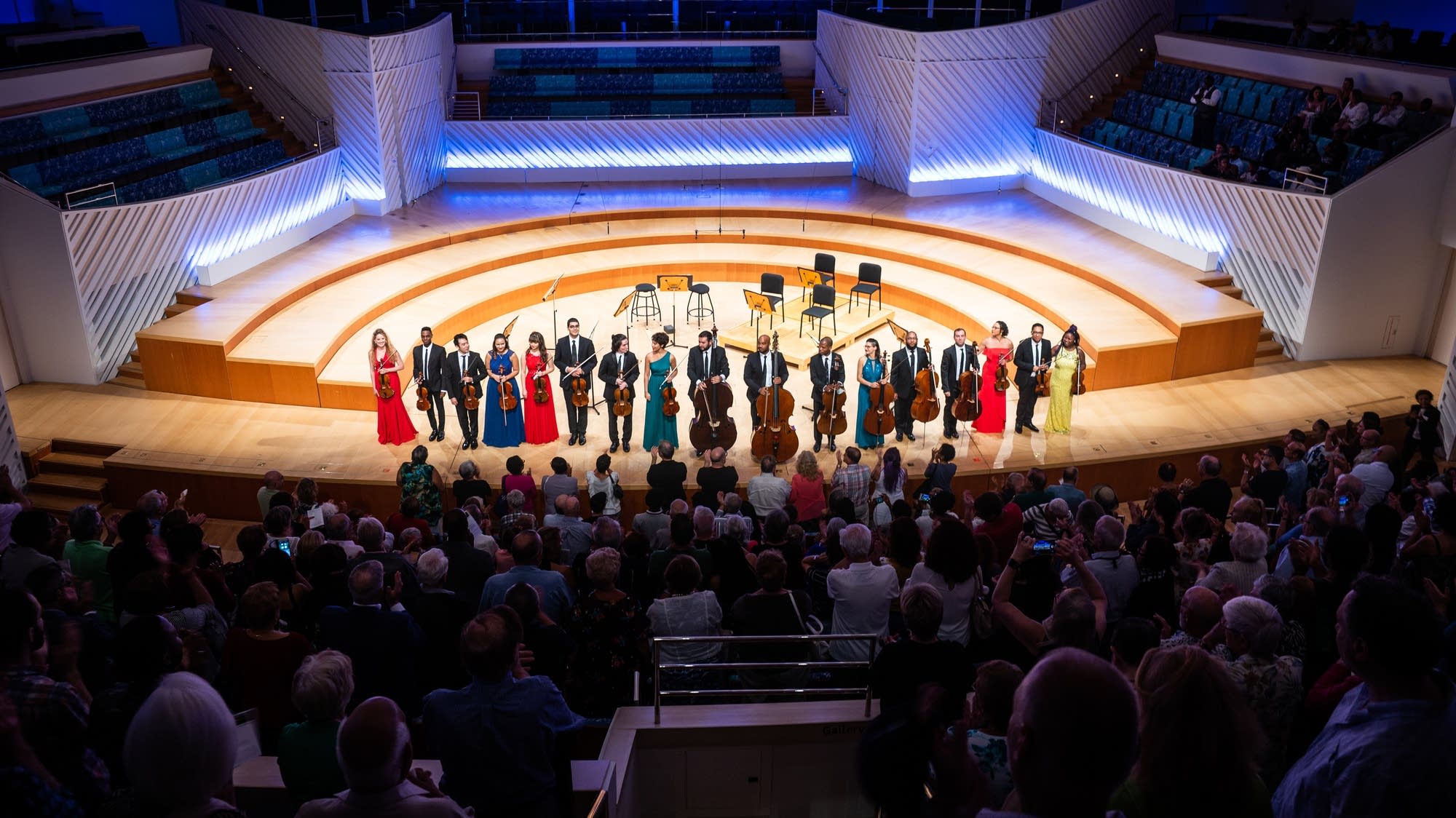 The Sphinx Virtuosi stand for applause while on tour.