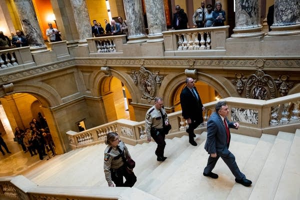 Sen. Hoffman walks up stairs