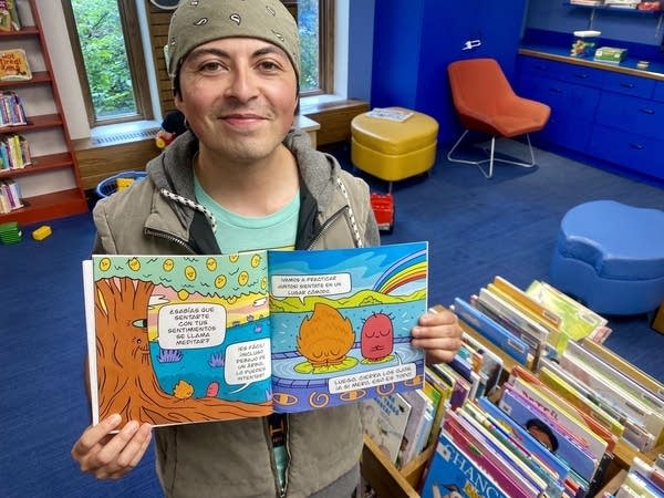 person holding book open