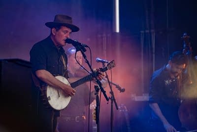 Gregory Alan Isakov and band performing on stage