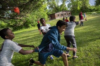 Khalid Musse, Abubakar Sherif and Bukhari Booker play capture the flag.