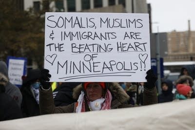 Protestor holding sign 