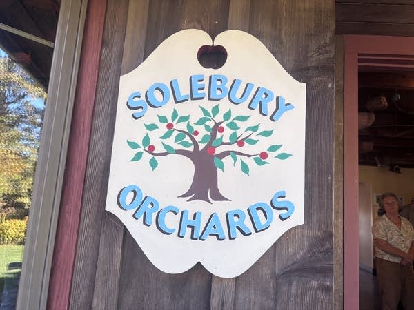 A hand-painted sign that reads Solebury Orchards