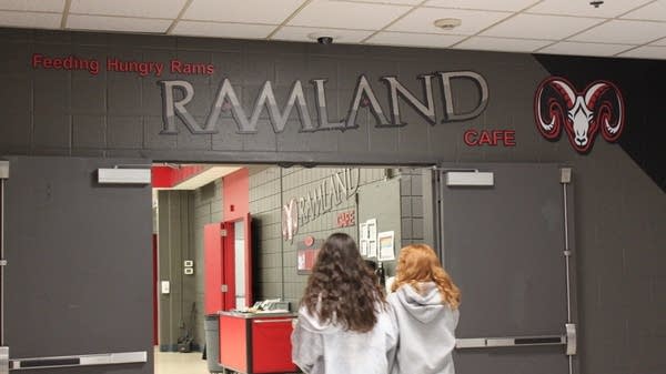 Students walk into the lunchroom at Cheshire High School in Cheshire, Connecticut.