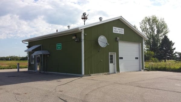 In Minnesota, an airport runway spans two countries