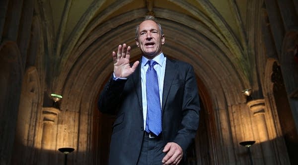 Tim Berners-Lee, inventor of the World Wide Web, waves to photographers as he arrives at Guildhall to receive an Honorary Freedom of the City of London award on September 24, 2014 in London, England.