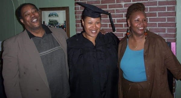 Nikki Massie and her parents when she completed her bachelor's degree.