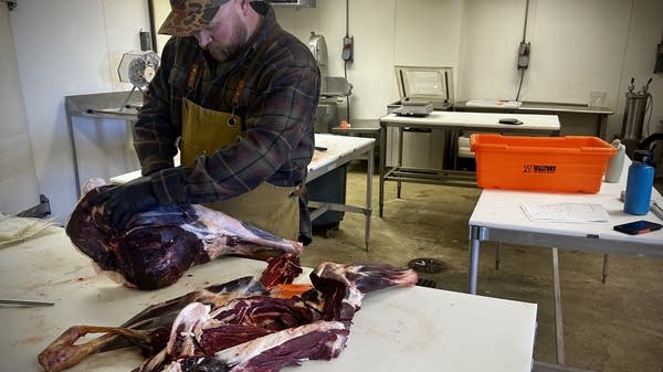 Chase Keenan cuts up some big game meat. He does this all day long, seven days a week.