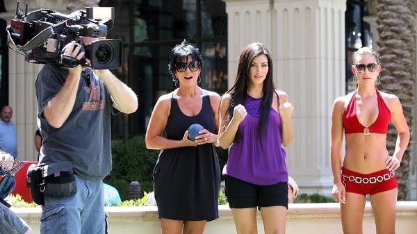Kris Jenner, left, her daughter Kim Kardashian and bocce ball instructor Jackie Savitt film an episode of "Keeping Up With the Kardashians" in 2008. 