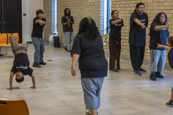 a youth theater group performs