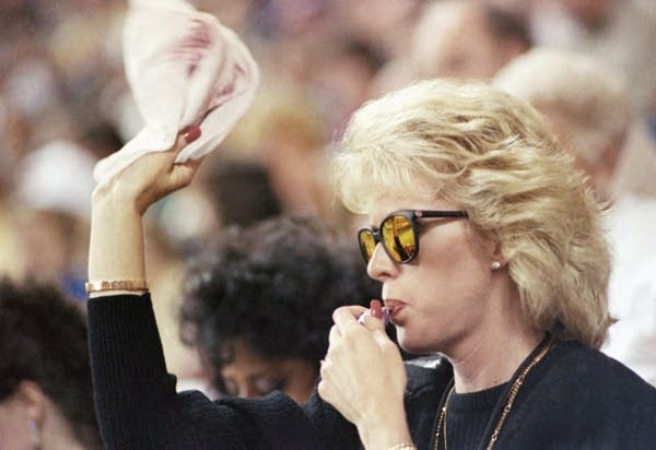 Patty Blyleven waves her Homer Hanky