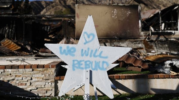 Pauline Gray lost her house in the Southern California wildfires. But "2026 is going to be a beautiful year," she said, "because 2025 was not."