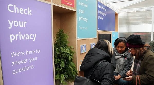 Facebook employees talks to visitors as the social network Facebook opens a pop-up kiosk for one day on December 13, 2018, in Bryant Park in New York, where it will field questions about its data-sharing practices and teach users how to understand its new privacy controls.