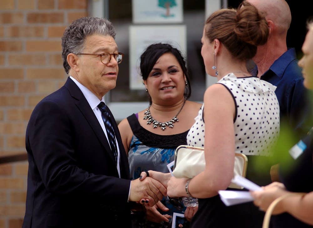 Sen. Al Franken greets mourners