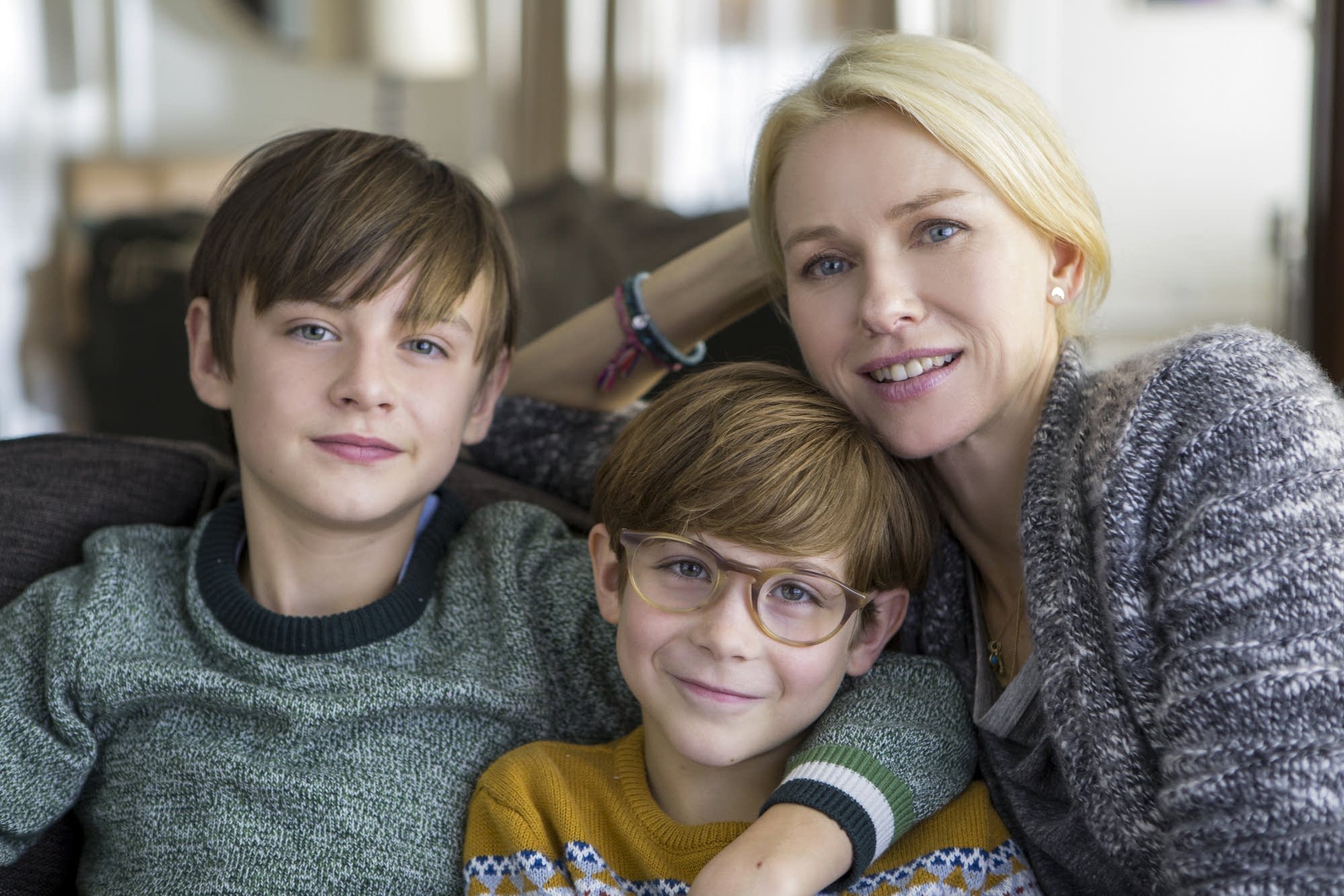 Jaeden Lieberher as Henry, Jacob Tremblay as Peter and Naomi Watts as Susan