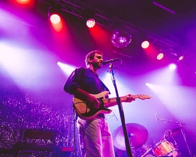 willy mason and his band performing on stage