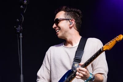 cory wong playing guitar on stage