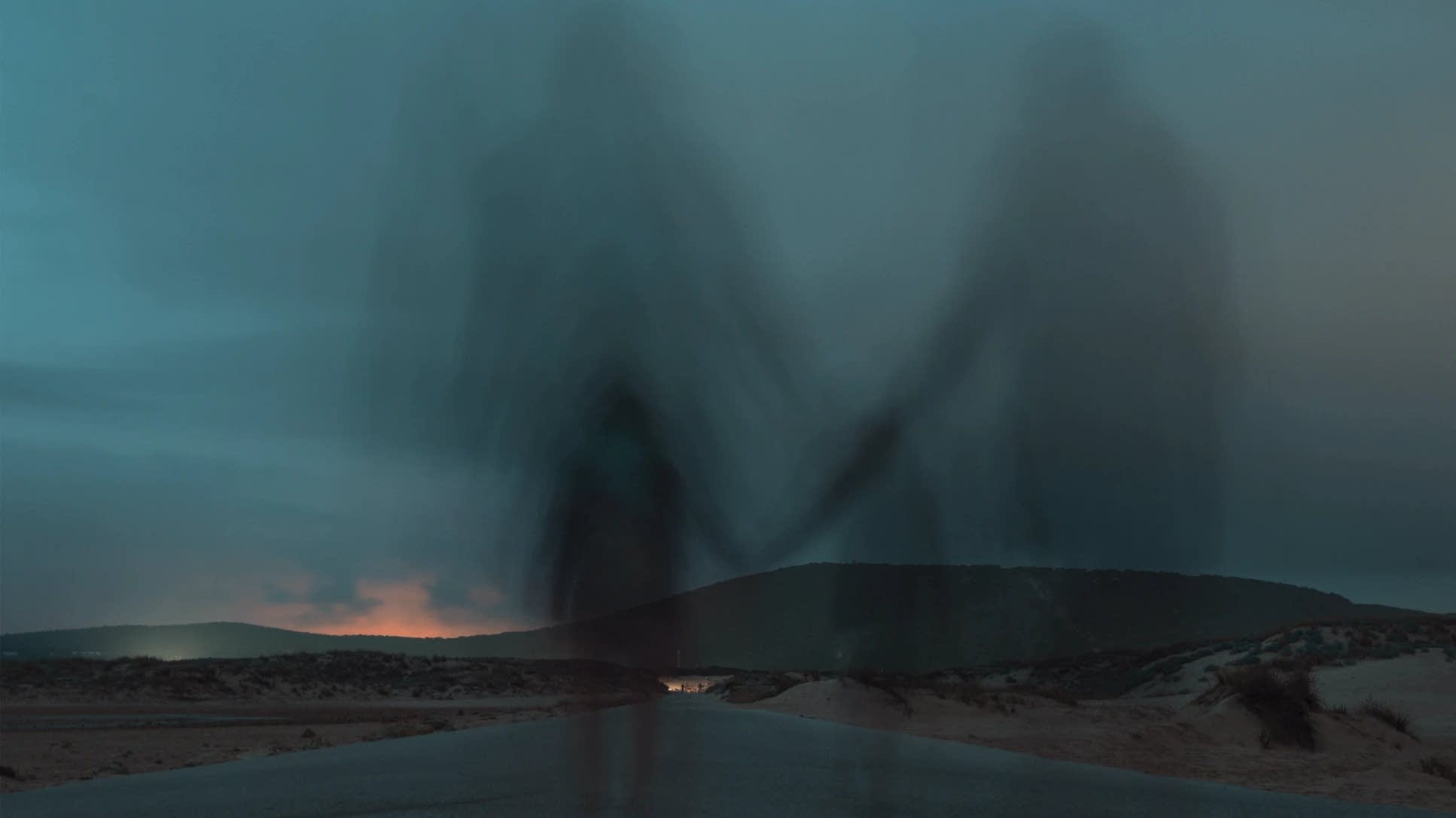 Two mysterious figures.