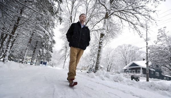 Andy Sandness walks to the Saint Marys Hospital campus at Mayo Clinic