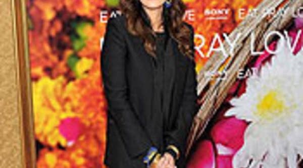 Actress Julia Roberts attends the premiere of "Eat Pray Love" at the Ziegfeld Theatre in New York City.