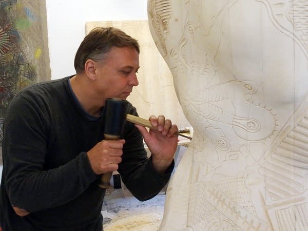 Aaron Spangler at work on the commission.