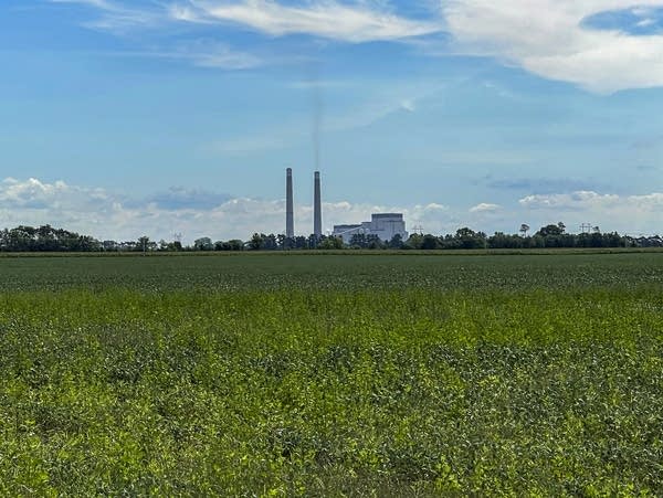 Sherco is visible across a farm field