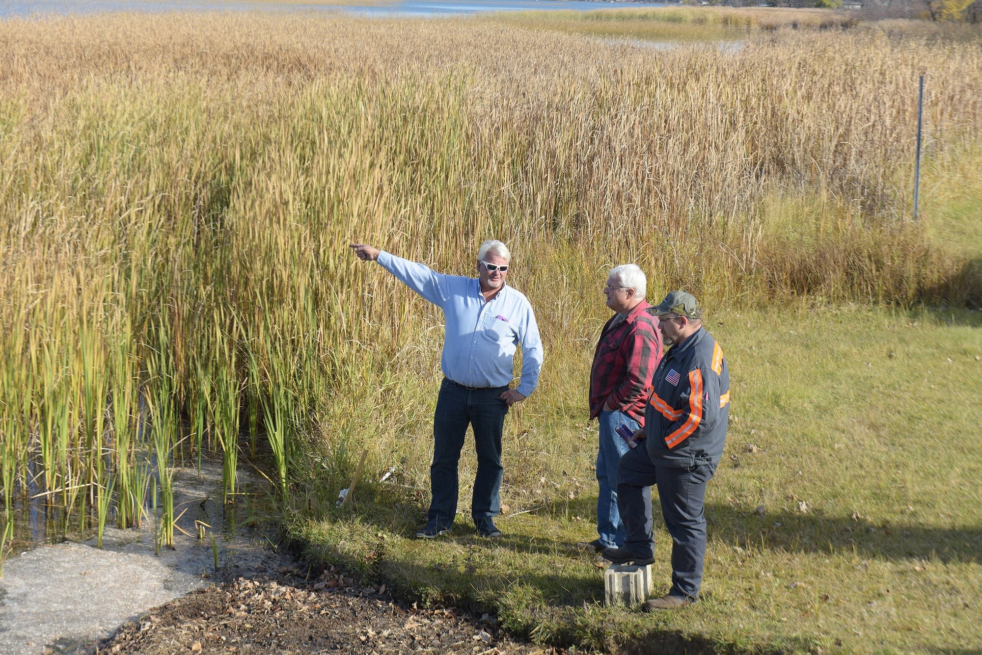 Steve Stohr (left) of Peterson Towing points to the monstrous bog Thursday.