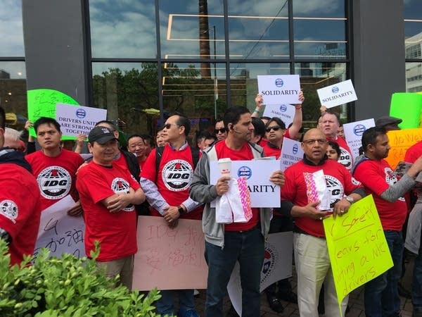 Drivers protest at Uber's New York headquarters.