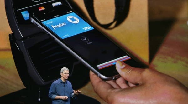 Apple CEO Tim Cook speaks at an Apple special event unveiling the iPhone 6. Apple has been ordered to unlock an iPhone used by one of the San Bernardino attackers.
