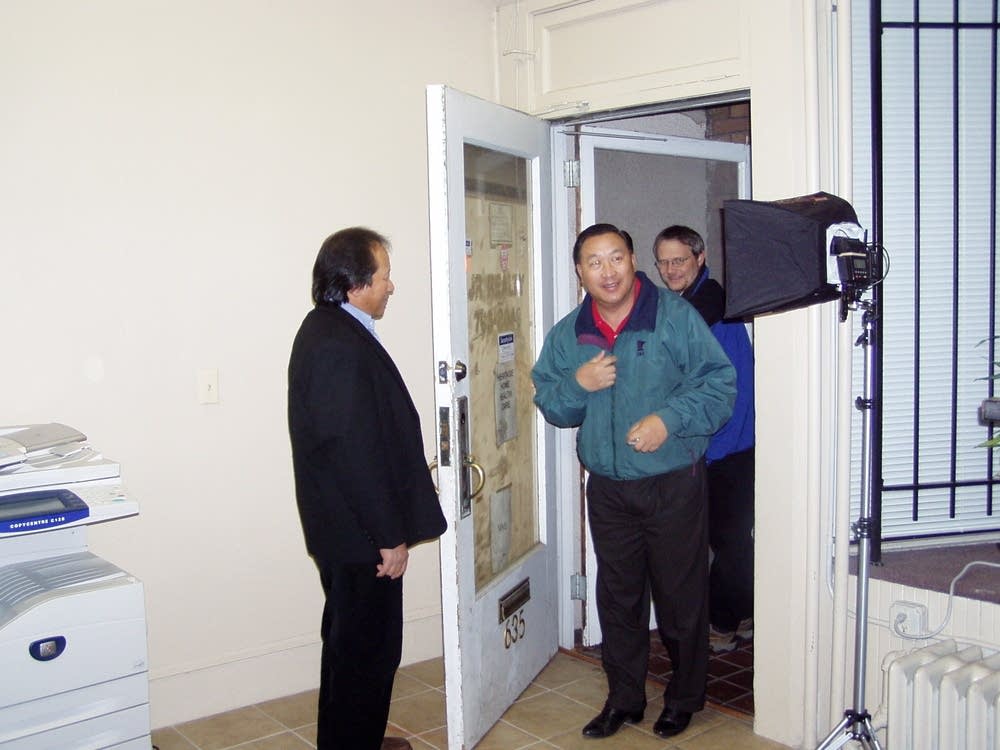 Leng Wong greets his brother