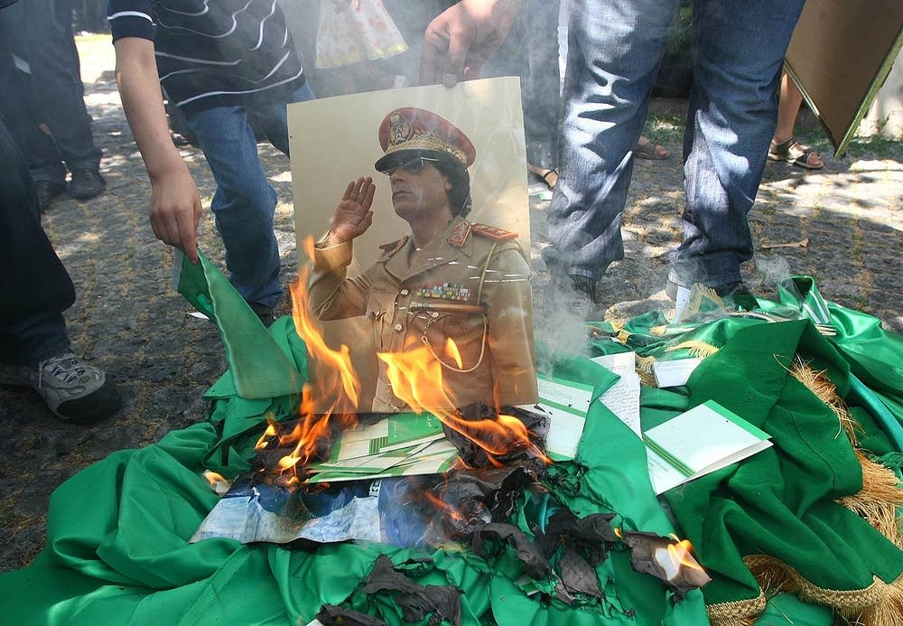 Portrait of Moammar Gadhafi burns
