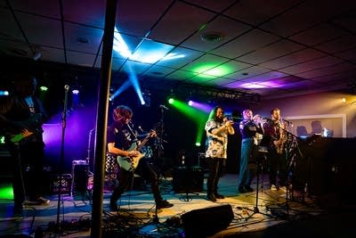 A band performing onstage