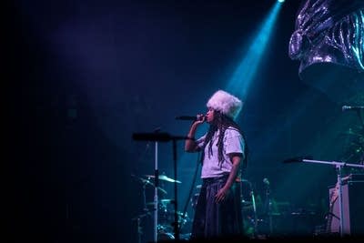 Ambré performing on stage