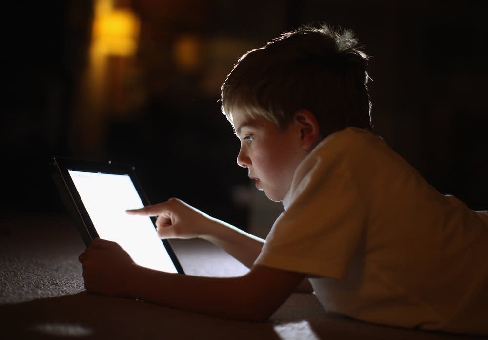 Kid on iPad