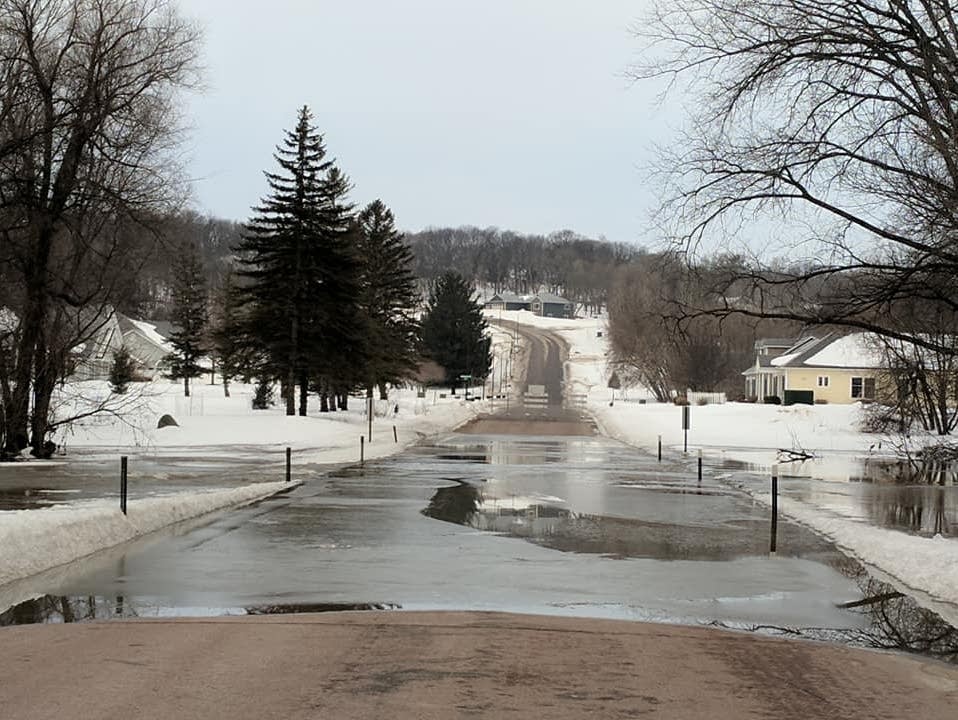 Cottonwood Street in New Ulm Minn is closed by floodwaters