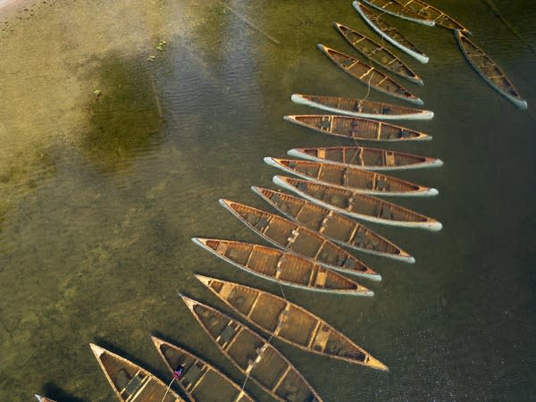 In Ely, submerged canoes are symbol of hope