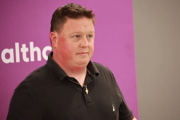 man in black shirt speaking2