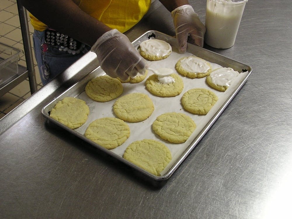 Icing cookies at the Cookie Cart Bakery