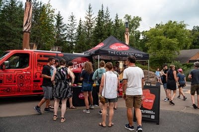 Crowd gathered around The Current tent
